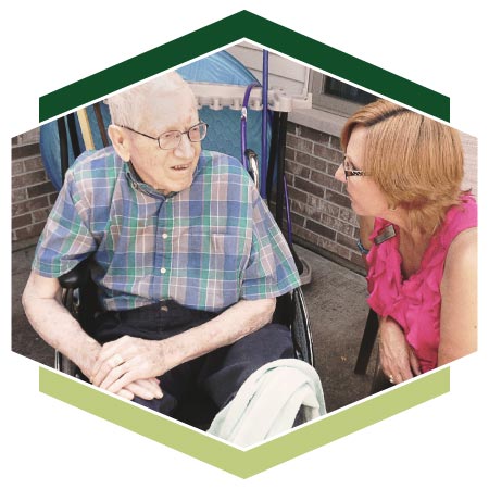 Alzheimer's resident enjoying some time sitting outside